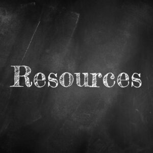 An image with a black chalkboard background with white letters that read "Resources."